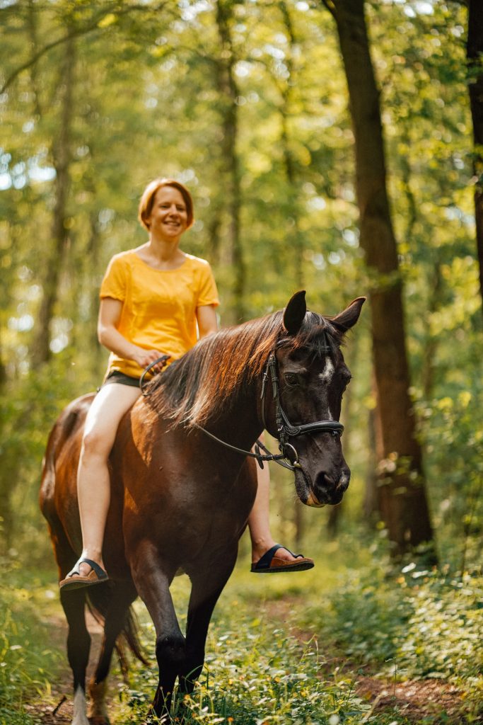 Woman riding on horse